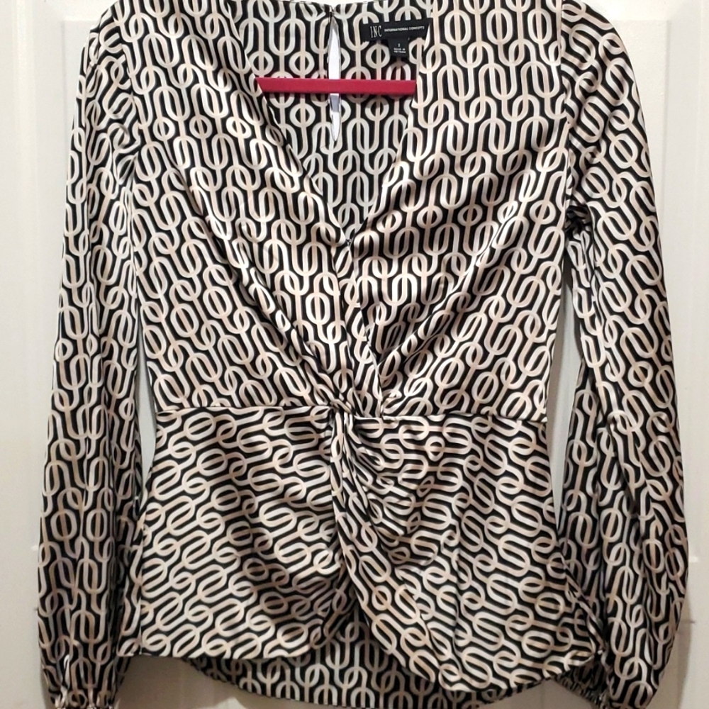 INC blouse , geometric fabric pattern sized as a 2